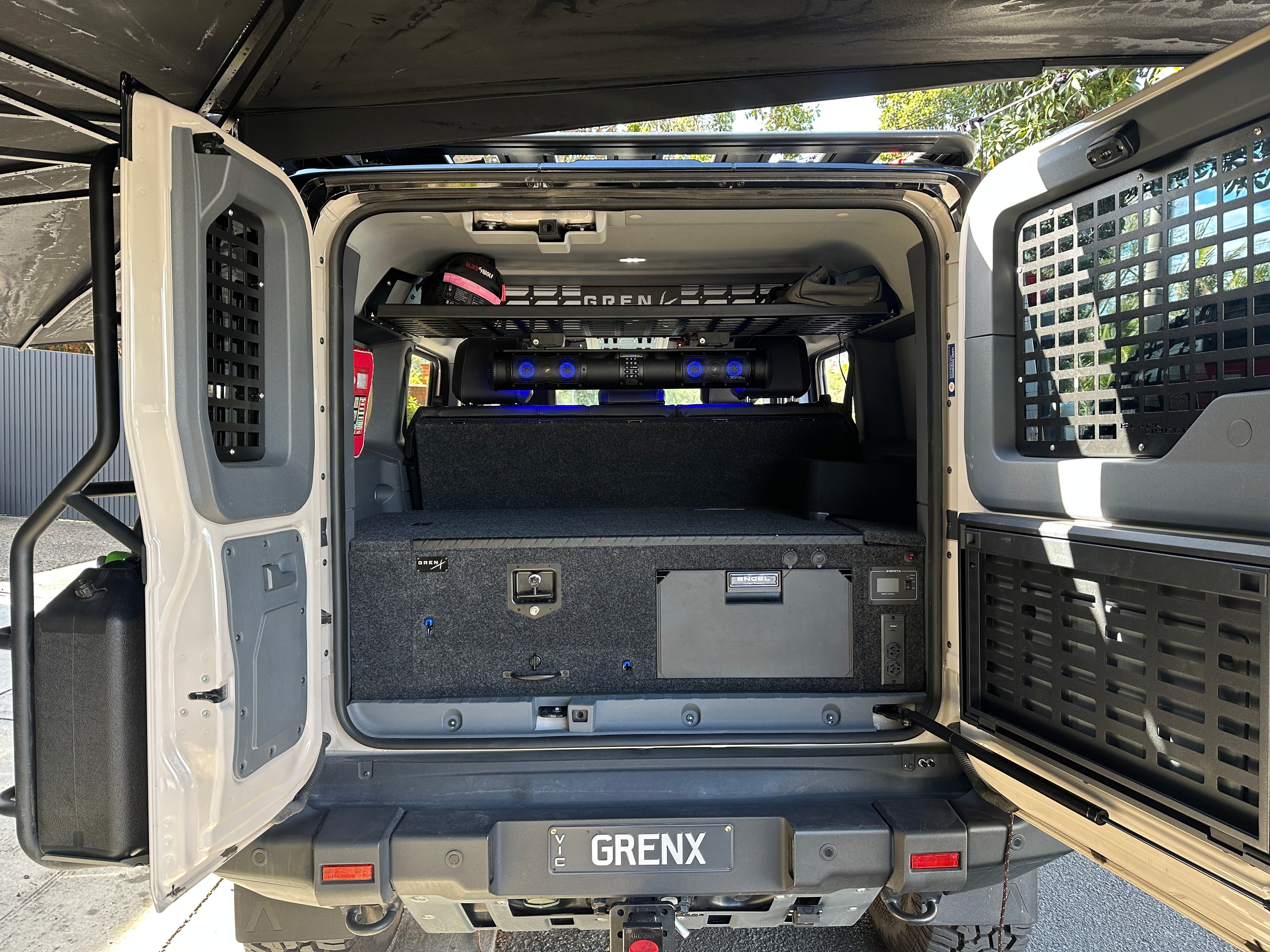 GrenX drawer system with integrated fridge & double bed platform Ineos Grenadier