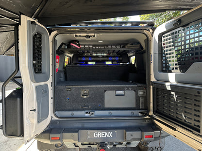 GrenX drawer system with integrated fridge & double bed platform Ineos Grenadier