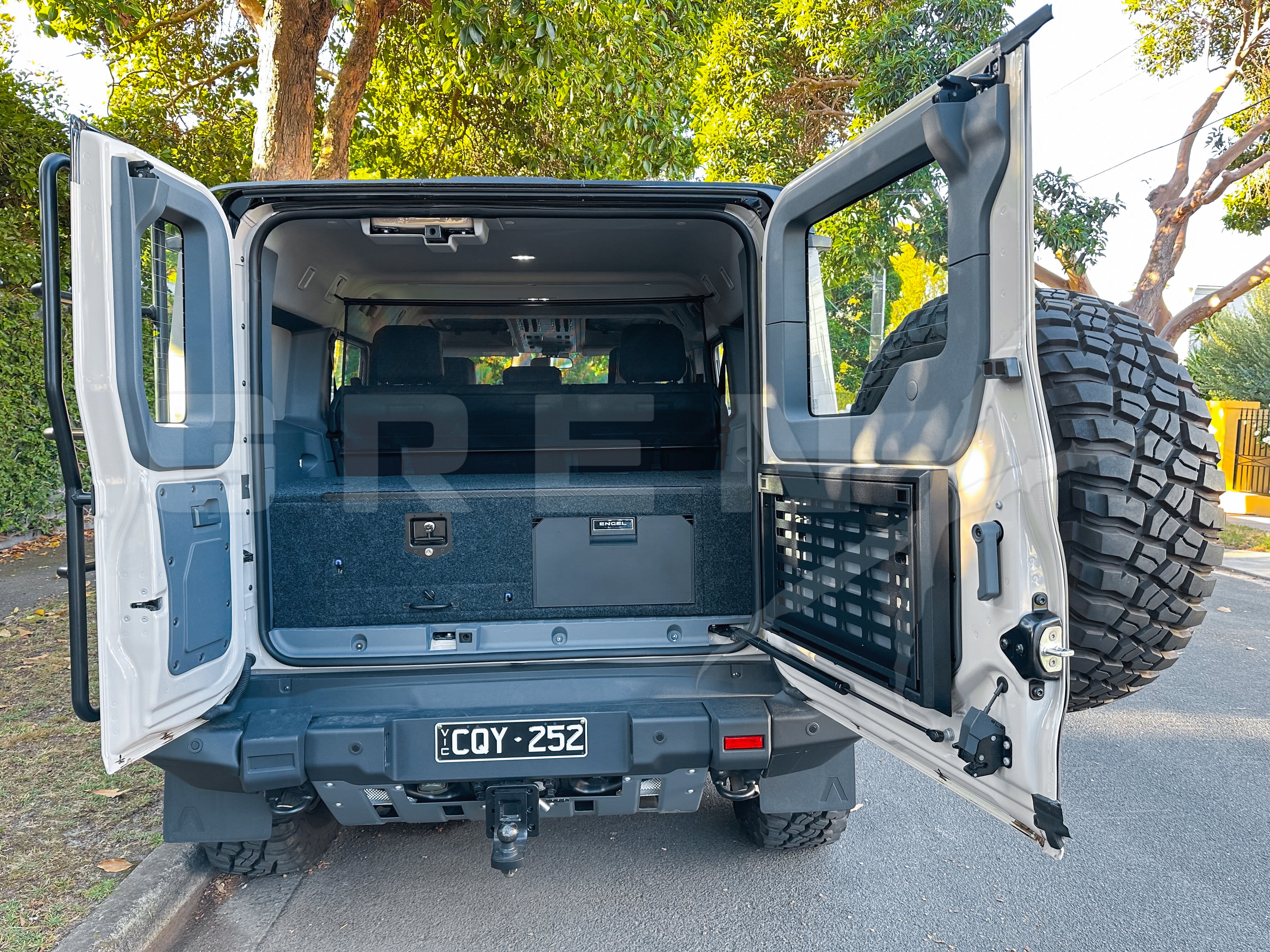 GrenX drawer system with integrated fridge & double bed platform Ineos Grenadier