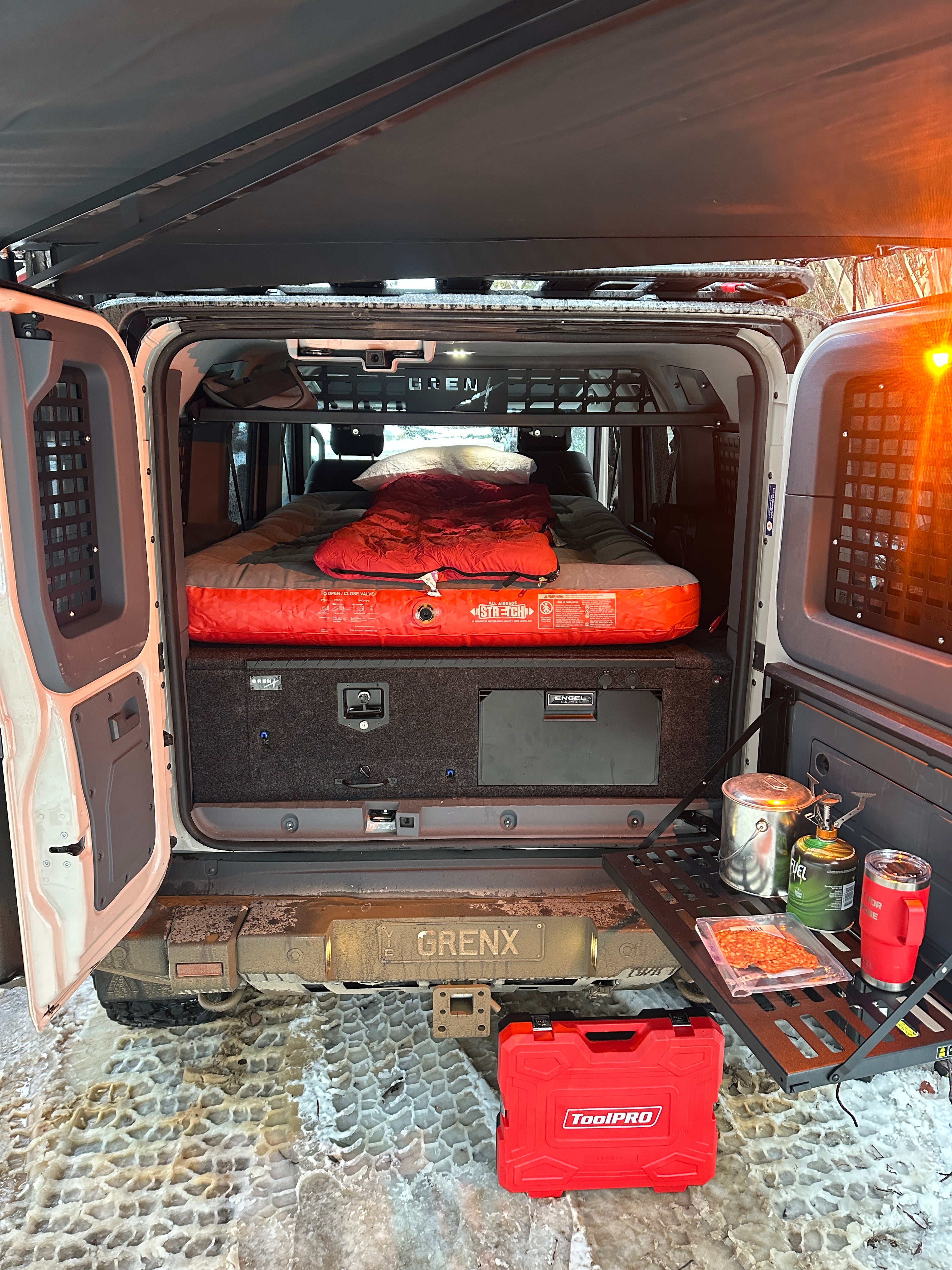 GrenX drawer system with integrated fridge & double bed platform Ineos Grenadier