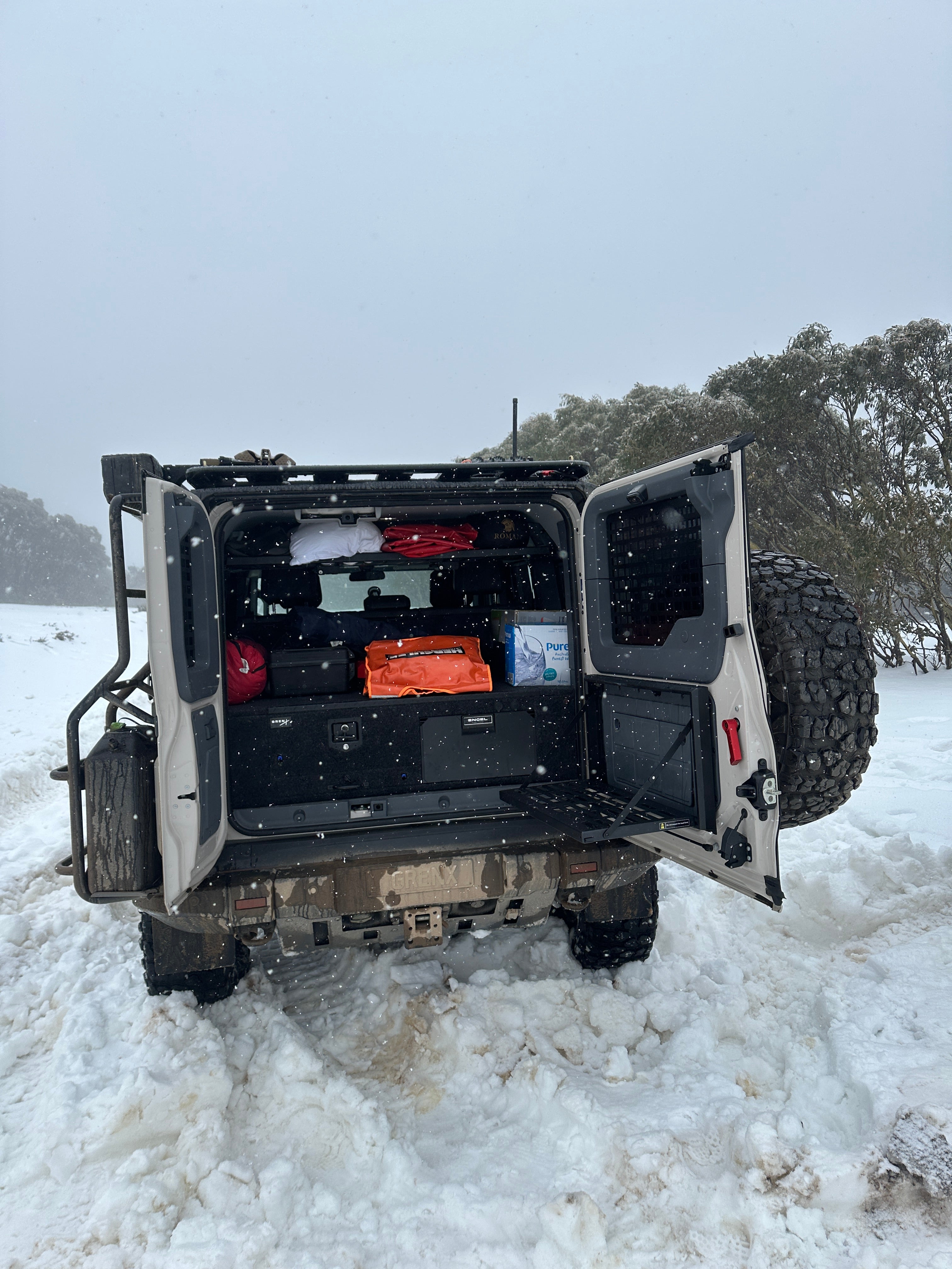 GrenX drawer system with integrated fridge & double bed platform Ineos Grenadier